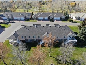 multi unit home complex completed roofing image from drone