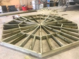 Gazebo construction in process image, showing the octogonal ceiling frame.